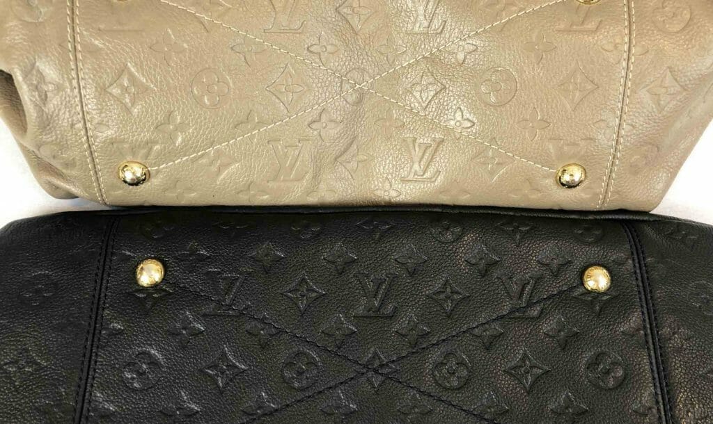 fake louis vuttion bag vs real . close up of bootom of bag .