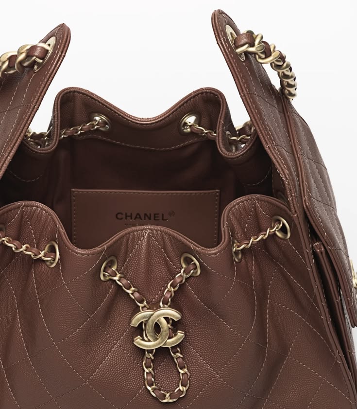 Interior view of the ch@nel 25 Small Handbag with premium lining, zip pocket, and spacious storage compartment