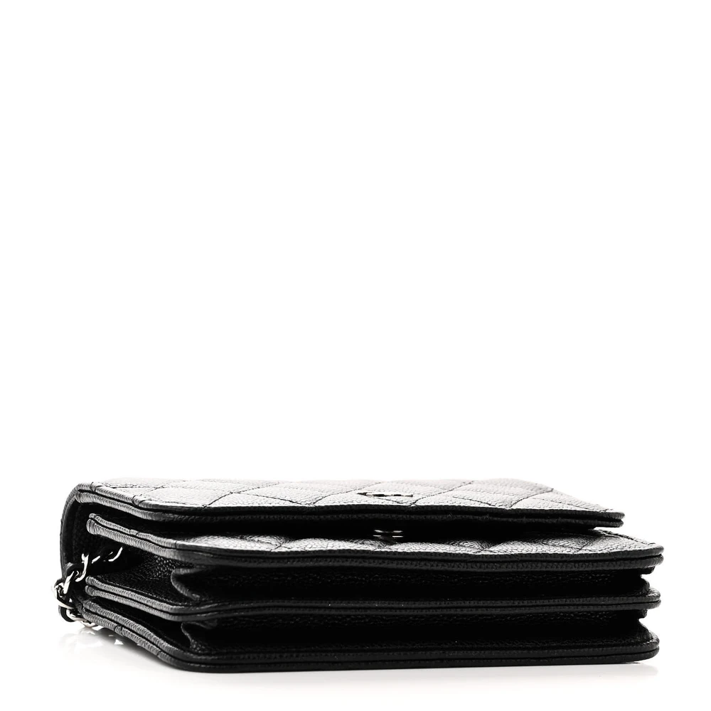Bottom view of the black caviar leather Mini Wallet On Chain showing the structured leather base