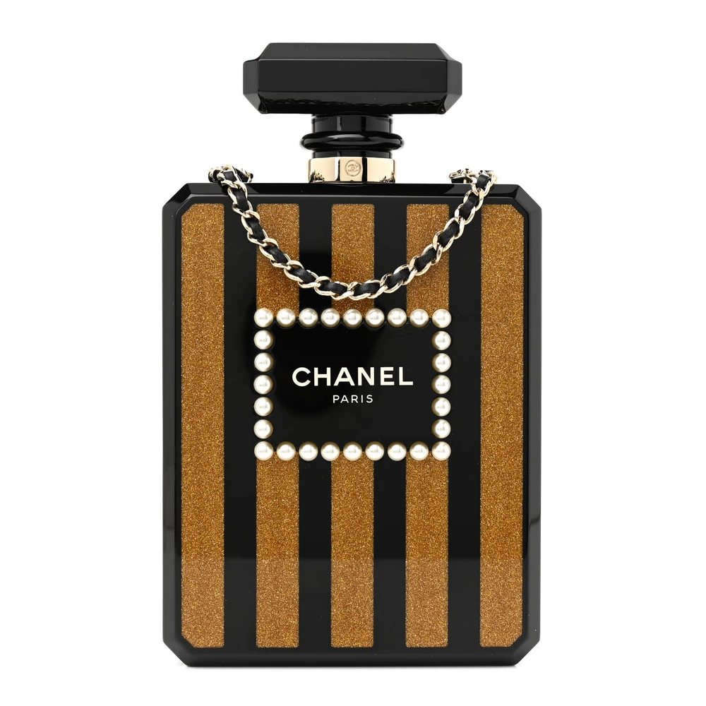 Front view of the black and gold plexiglass Perfume Bottle Clutch