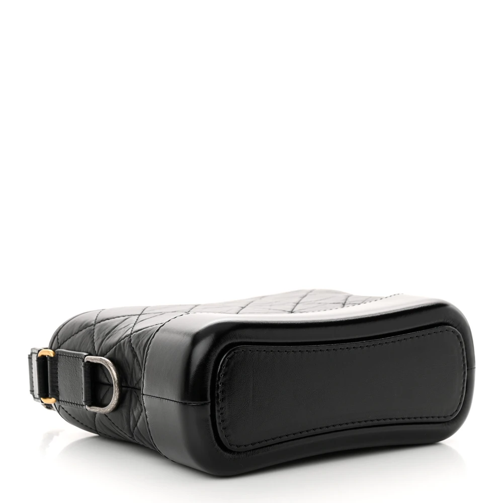 Bottom view of the Small Gabrielle Hobo showing the structured leather base