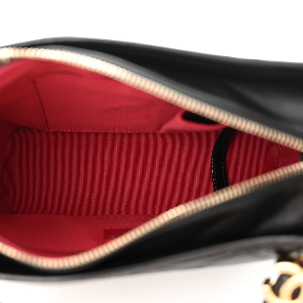 Bottom view of the Small Gabrielle Hobo showing the structured leather base