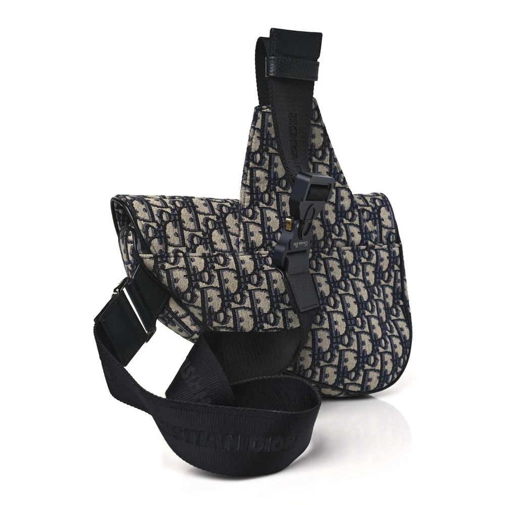 Back view of the blue Dior Oblique jacquard Men's Saddle Bag