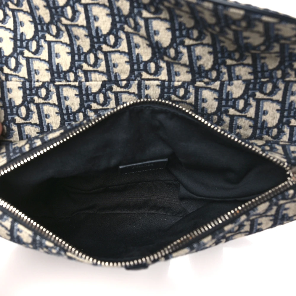 Interior view of the Men's Saddle Bag with fabric lining and spacious storage compartment