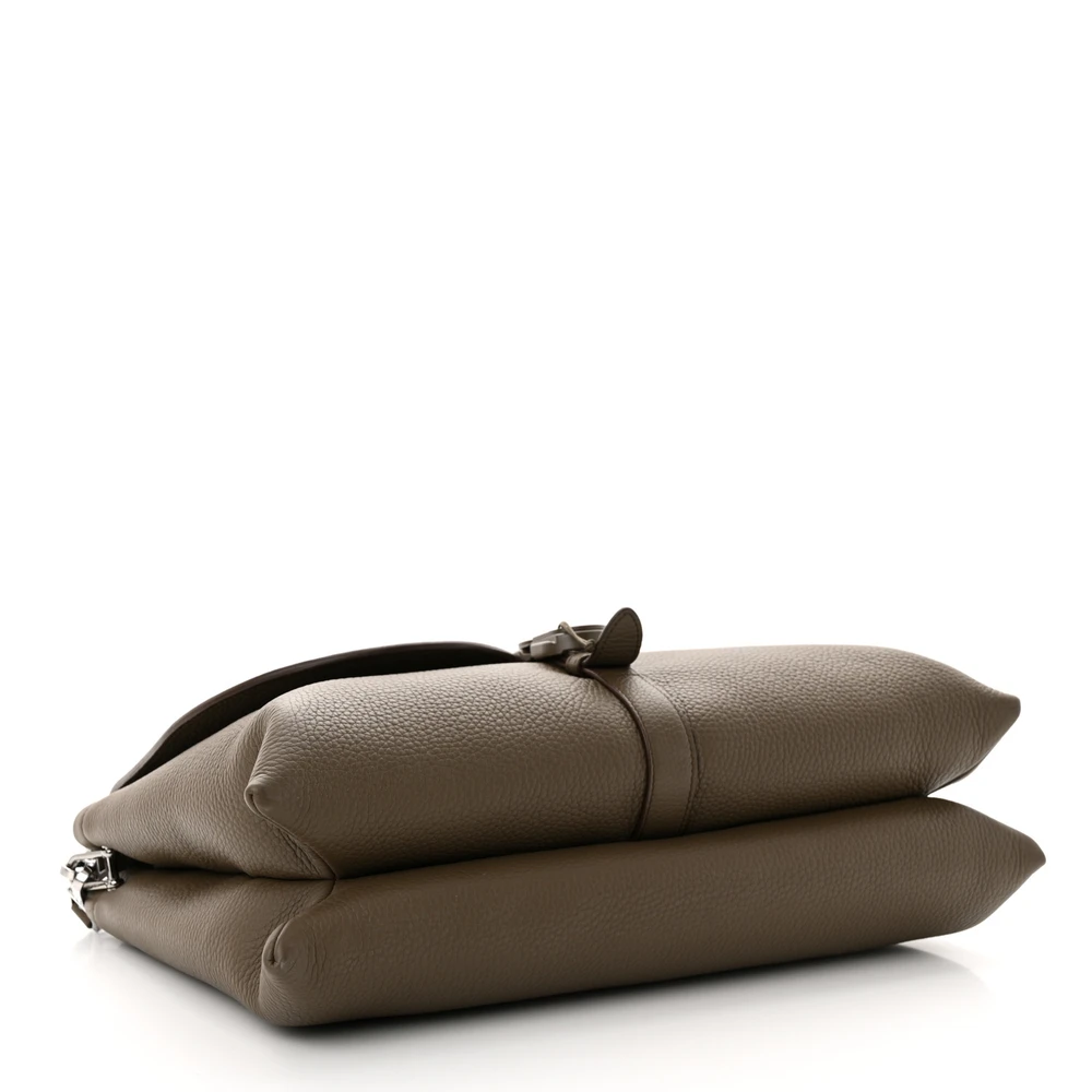 Bottom view of the khaki grained calfskin Men's Pillow Bag showing the padded leather base