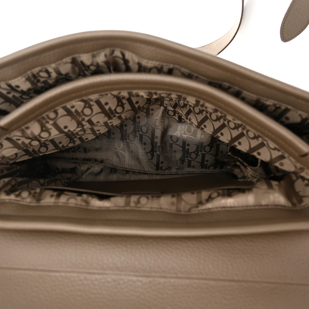 Interior view of the Men's Pillow Bag with spacious compartment and premium lining