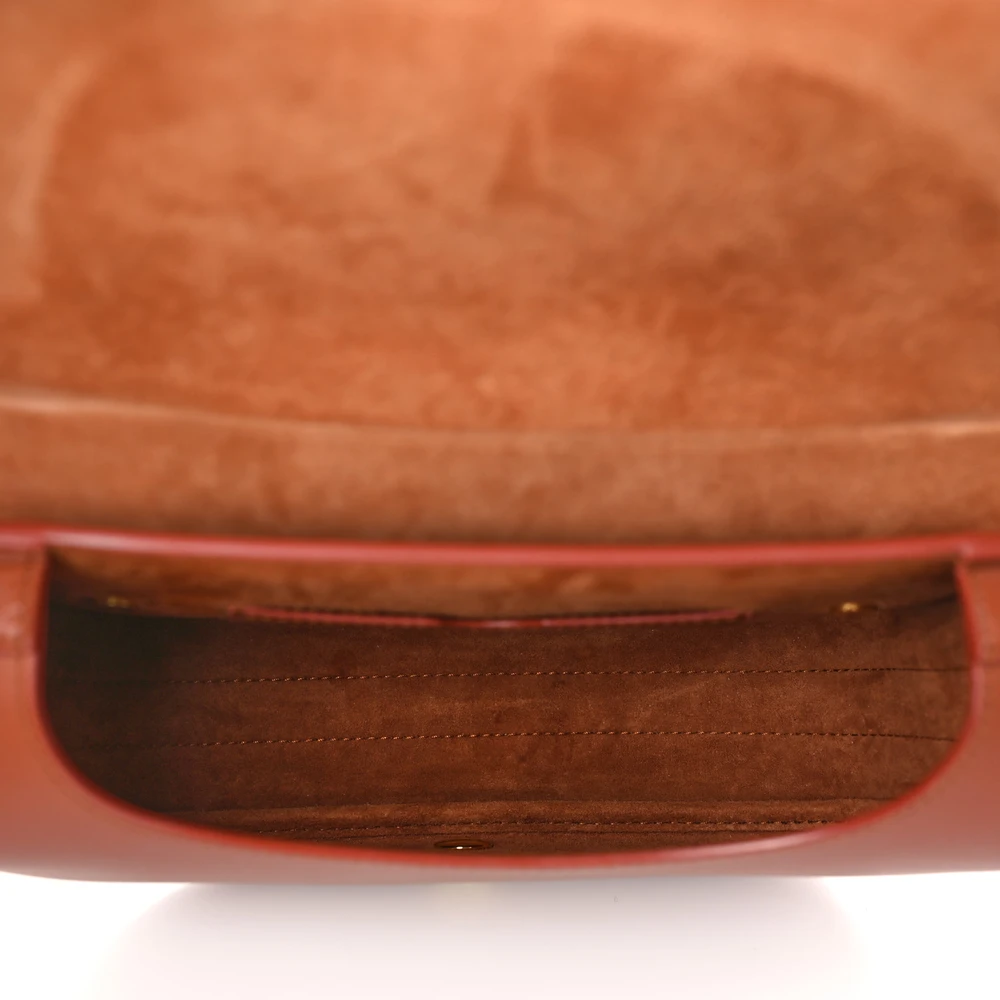 Interior view of the D!0r Medium Bobby Flap Bag with leather lining and organized storage compartments