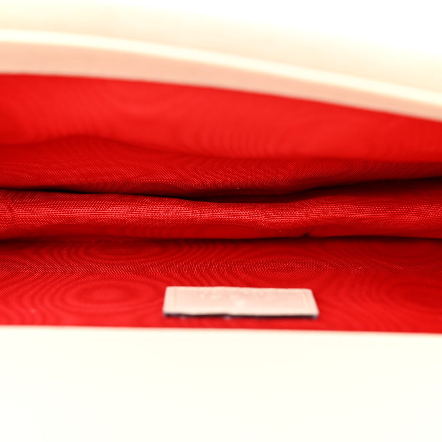 Interior view of the Lunar New Year Small Dionysus Shoulder Bag with premium lining and organized compartments