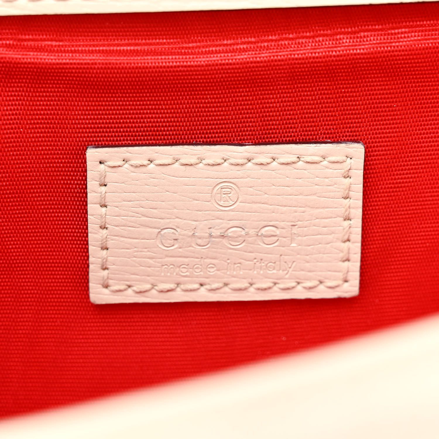Close-up of the tiger head spur closure and antique silver-tone hardware on the Lunar New Year Small Dionysus Shoulder Bag