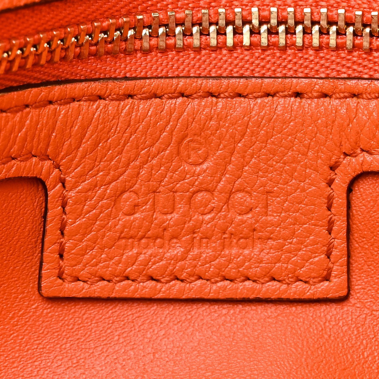 Close-up of the Round Interlocking G logo and gold-tone hardware on the Roxy Calfskin Blondie Chain Shoulder Flap Bag