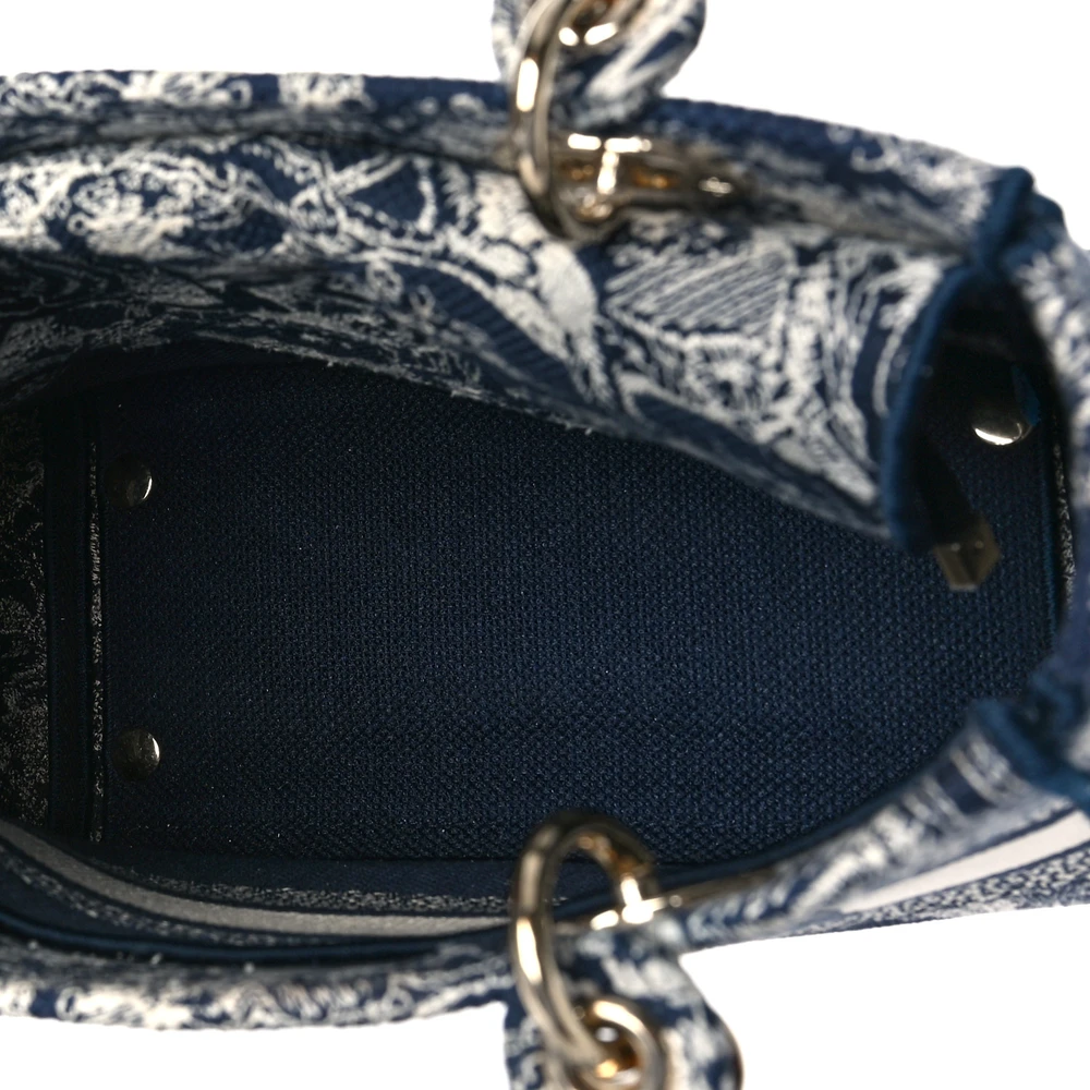 Interior view of the Medium Lady D-Lite bag with canvas lining and spacious storage compartment
