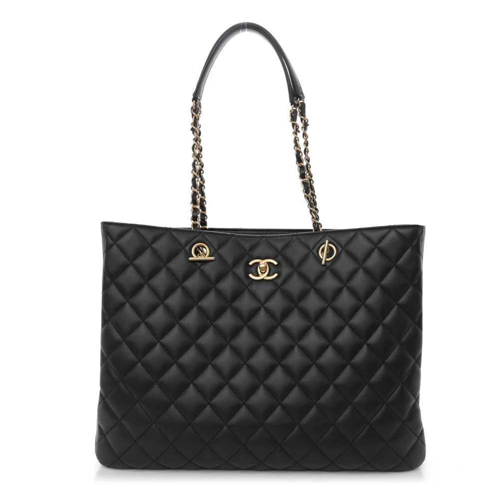 Front view of the black quilted calfskin Large Classic Shopping Tote with gold-tone hardware