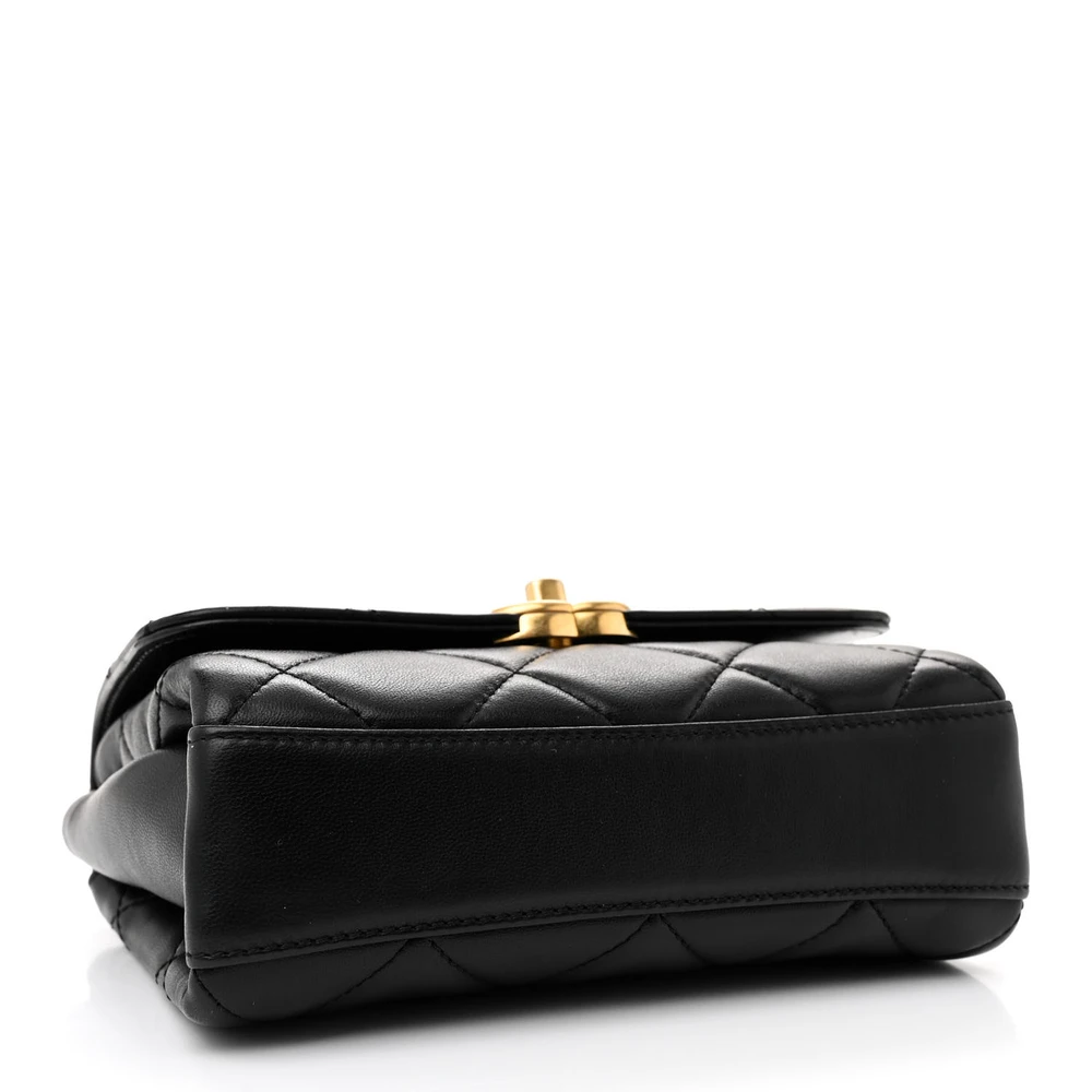 Bottom view of the black lambskin CC Crystal Logo Chain Flap showing the structured leather base